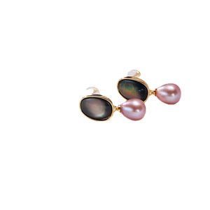 Elegant gold earrings featuring teardrop pink pearls and oval dark shell accents