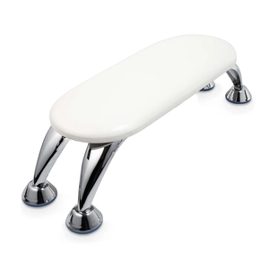 White faux leather pedicure footrest stool with elegant chrome metal legs and modern design