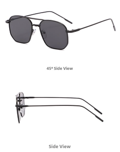 Detail view of double bridge sunglasses with metal frames and polygon grey lenses