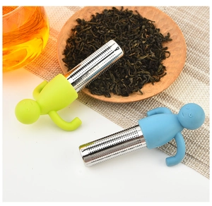 Close-up of creative little man tea infusers in green and blue with stainless steel filters