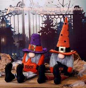 Detail of Halloween gnomes with long legs holding Boo and Trick or Treat signs