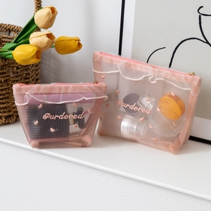 Pink mesh makeup bag set with heart embroidery and wavy ruffles in two sizes