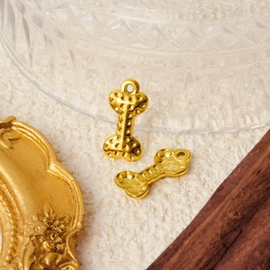 304 stainless steel golden dog bone charm with dotted texture for DIY jewelry making