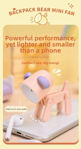 Mini pink and purple dog LED night light with adjustable limbs shown on a smartphone