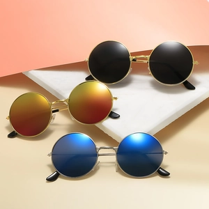 Vintage-Sonnenbrille mit runden Metallrahmen in Schwarz, Orange und Blau verlaufend