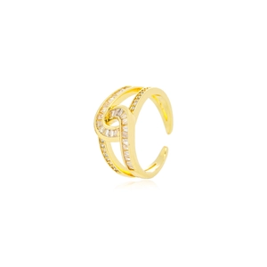 Luxurious gold crisscross ring with sparkling zircon stones on a white background
