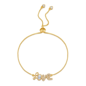 Macro shot of gold-plated Love heart bracelet with sparkling zircon and adjustable bolo chain