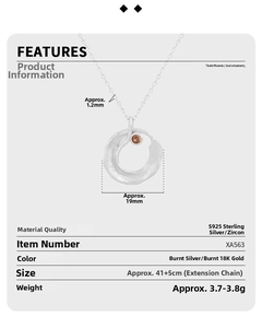 S925 silver necklace features an irregular textured ring with amber cubic zirconia