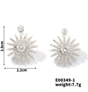 Macro detail of sunburst cubic zirconia earrings with 2.8cm size and 7.7g weight info