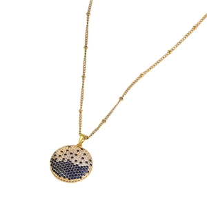 Elegant gold planet disc necklace featuring blue and white pave-set stones on beaded chain