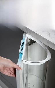 Close-up of wall-mounted kitchen waste bin showing 2cm door hook interior dimensions