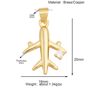 Detailed measurement diagram for a gold airplane pendant with crystal accent and dimensions