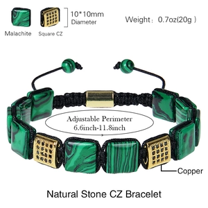 Square malachite beaded bracelet with micro-pave gold charms on a clean white background