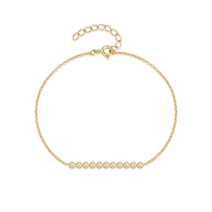 Detail of a gold bar bracelet with 11 round clear zircons and an adjustable lobster clasp