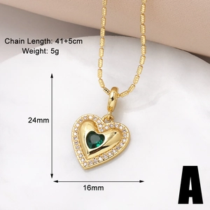 Macro shot of gold heart necklace with green zircon pendant and detailed size parameters