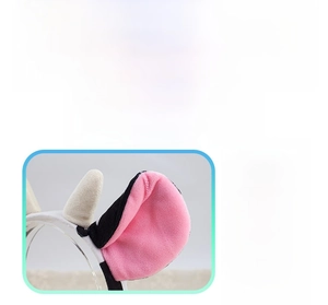 Close-up of soft crystal plush fabric and detailed cow ears on the party headband