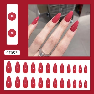 Elegant deep red long almond press-on nails with full 24-piece set and hand display