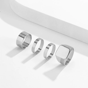 Minimalist 4-piece silver stainless steel ring set for men in high-polished finish
