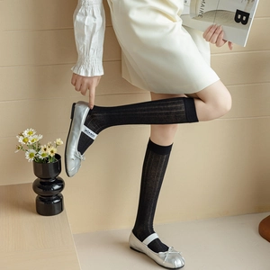 Ballet style black mesh over-the-knee socks with breathable vertical striped knit texture