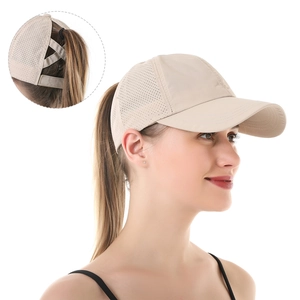 Detail of beige ponytail baseball cap with breathable mesh and elastic cross back opening