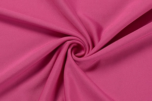 Détail macro du tissu en maille magenta avec de fins motifs nervurés horizontaux