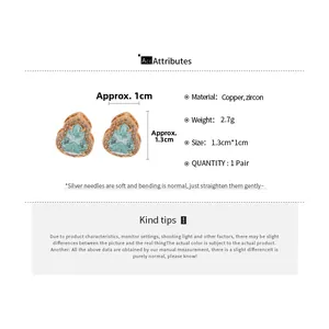 Spécifications détaillées des boucles d'oreilles cœur avec zircon bleu et fini or rose