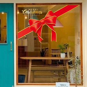 Red Christmas bow window sticker with Merry Christmas and Happy New Year gold lettering