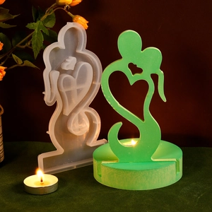 Romantic couple kissing heart-shaped silicone mold for DIY resin and plaster candle holder