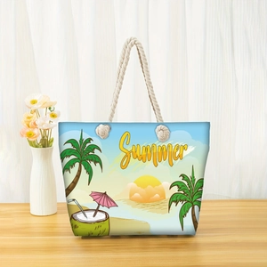Detail of beach tote bag with cotton rope handles and sunset palm tree illustration