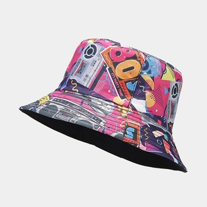 Reversible bucket hat featuring 80s retro cassette prints and colorful pop art patterns