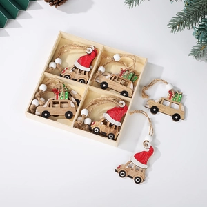 Detail of wooden Christmas car ornaments in a divided box with pine cone decorations