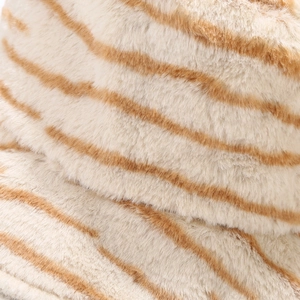 Macro shot of plush striped faux fur fabric showing soft texture of the bucket hat