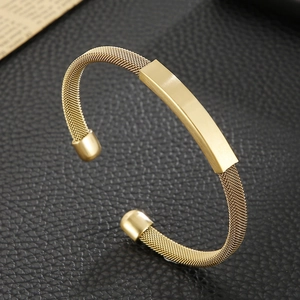 Fashionable gold stainless steel mesh bracelet featuring a polished rectangle center piece