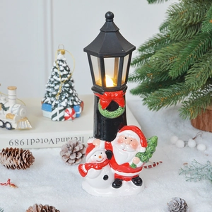 Christmas LED street lamp ornament with Santa and Snowman figures on snowy base