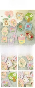 Detailed macro view of colorful crochet patches featuring tulip, cupcake, and puppy designs