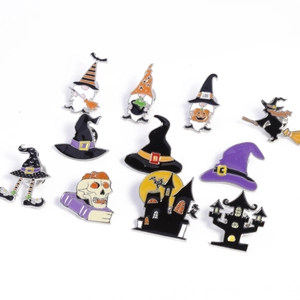 Variety set of Halloween enamel pins featuring wizard hats, ghosts, and haunted castles