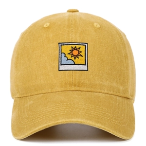 Detailed embroidery patch of sun and clouds on mustard yellow cotton baseball cap