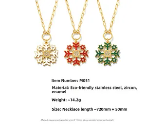 Detailed view of colorful enamel snowflake pendants with sparkling zircon on stainless chain