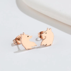 Polished rose gold wolf silhouette stud earrings in minimalist stainless steel