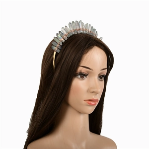 Detailed view of handmade iridescent crystal crown headband on a model head