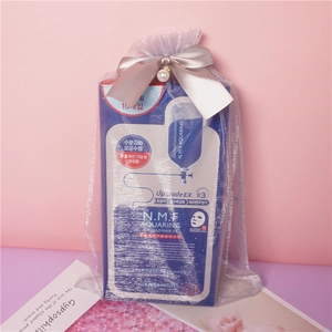 Sheer organza drawstring gift bag with pearl and bow for cosmetic mask packaging