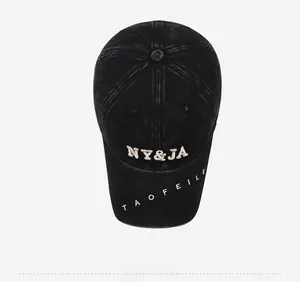Top view of washed black vintage baseball cap featuring 3D embroidered NY&JA lettering