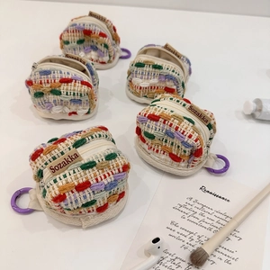 Colorful woven protective case for wireless earbuds with secure plastic carabiner clip
