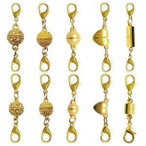 Gold magnetic jewelry clasps set in heart and ball shapes with sparkling rhinestones