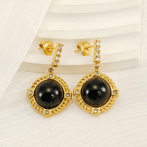 Gold plated titanium steel earrings featuring black natural stone and sparkling crystals