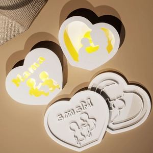 Heart-shaped Mother's Day resin molds featuring Mama text and mother-baby silhouettes