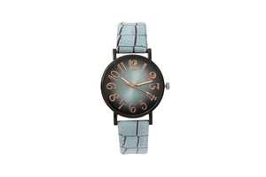 Detail view of light blue crocodile texture leather strap and vintage gradient watch dial