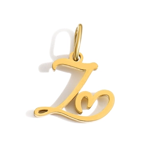 Detailed view of a gold Z-letter pendant featuring a polished heart-shaped charm