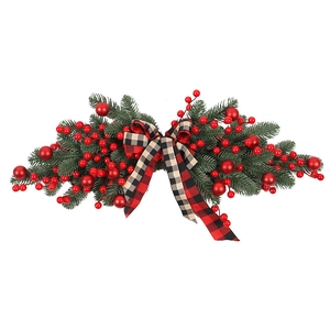 Christmas swag with red berries, pine branches and a red-black plaid ribbon bow decor