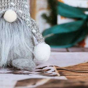 Nordic Christmas gnome plush with gray knit snowflake hat and long faux fur beard